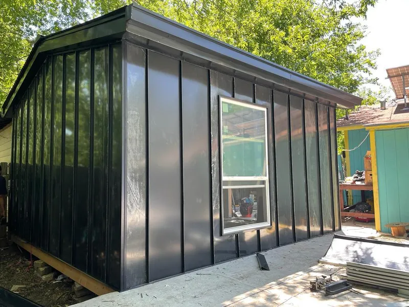 Black standing seam metal wall panels for Metal Roof Installation in North Aurora