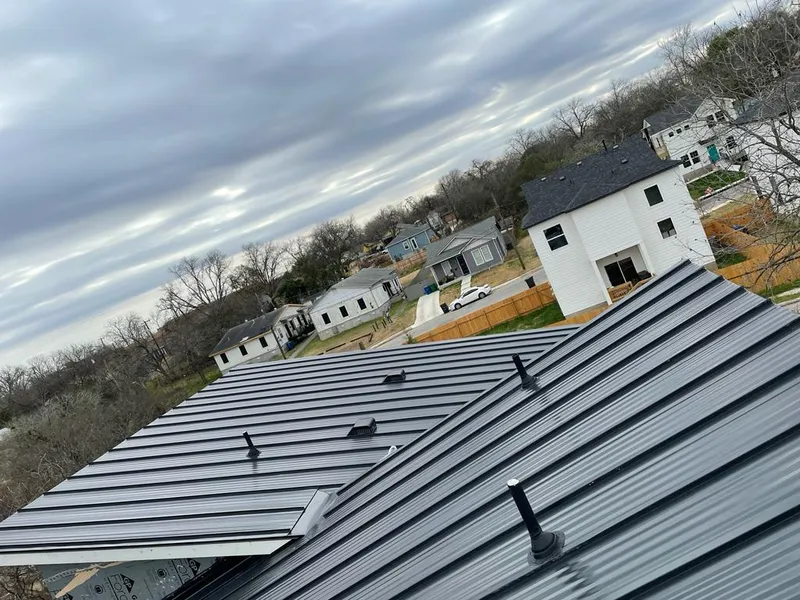 Standing seam metal roof panels with vents for Skylight Repair in North Aurora